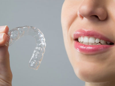 Take off your invisalign before eating.